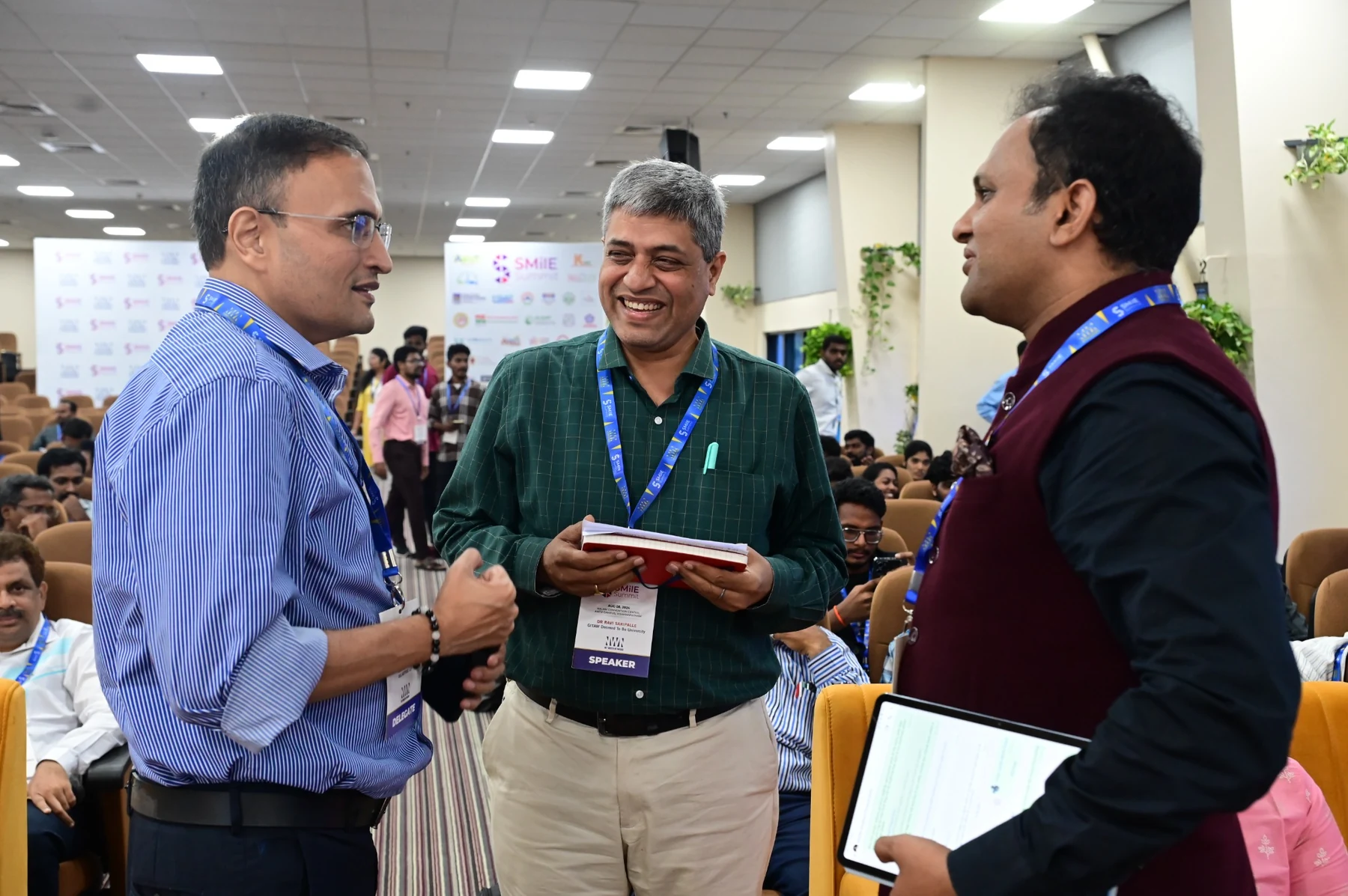 Business conversation at SMilE Summit